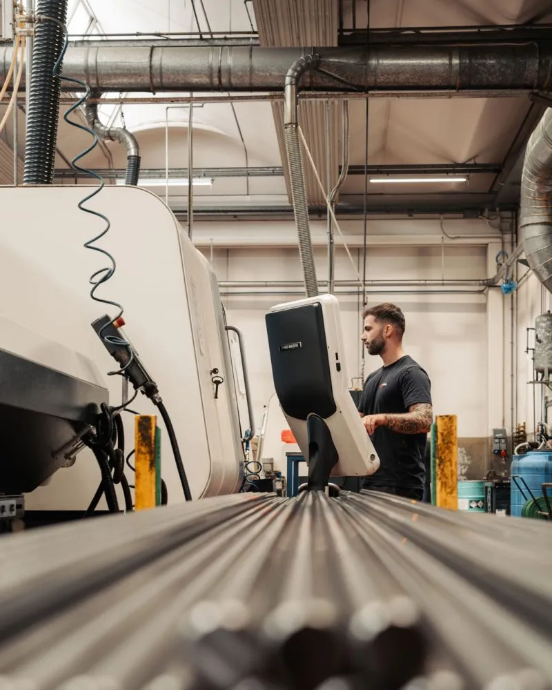 CNC precision machining operator during turning operation